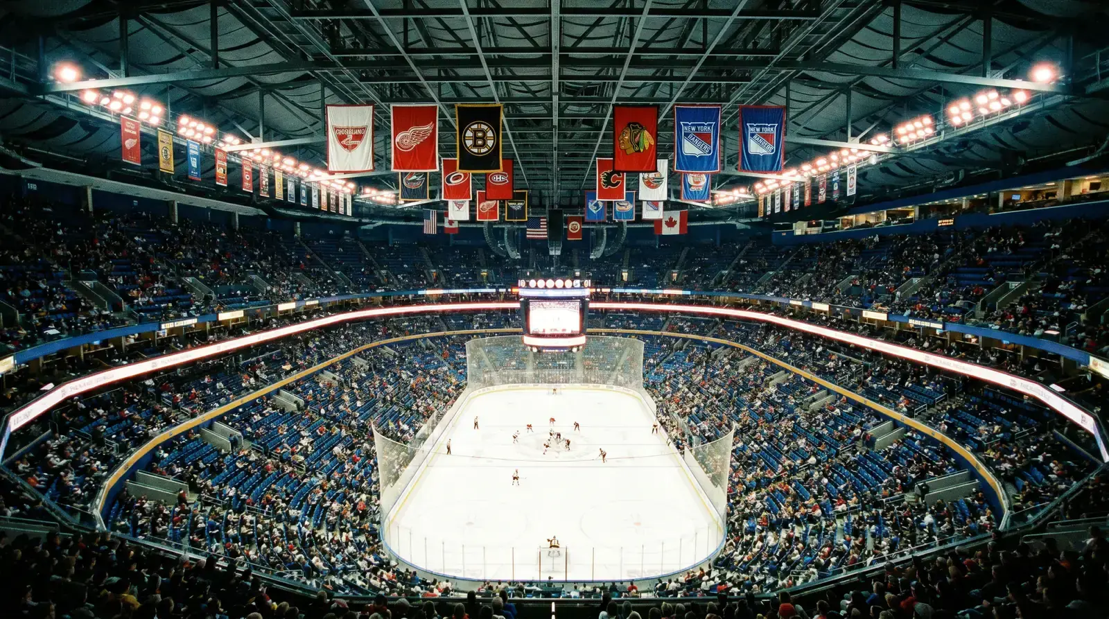 High-altitude NHL arena interior showing ice surface and seating