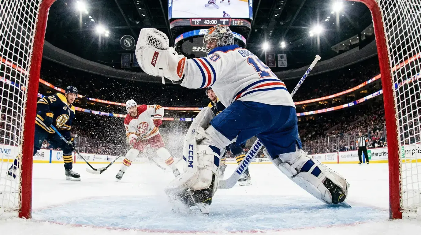 NHL goaltender making a save during a high-scoring game
