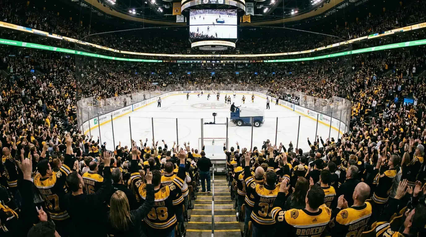 Enthusiastic home crowd cheering at an NHL hockey game