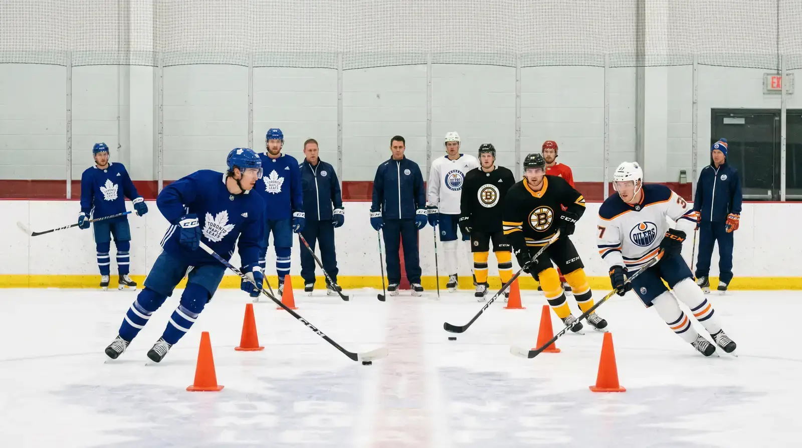 NHL preseason training camp with players skating drills