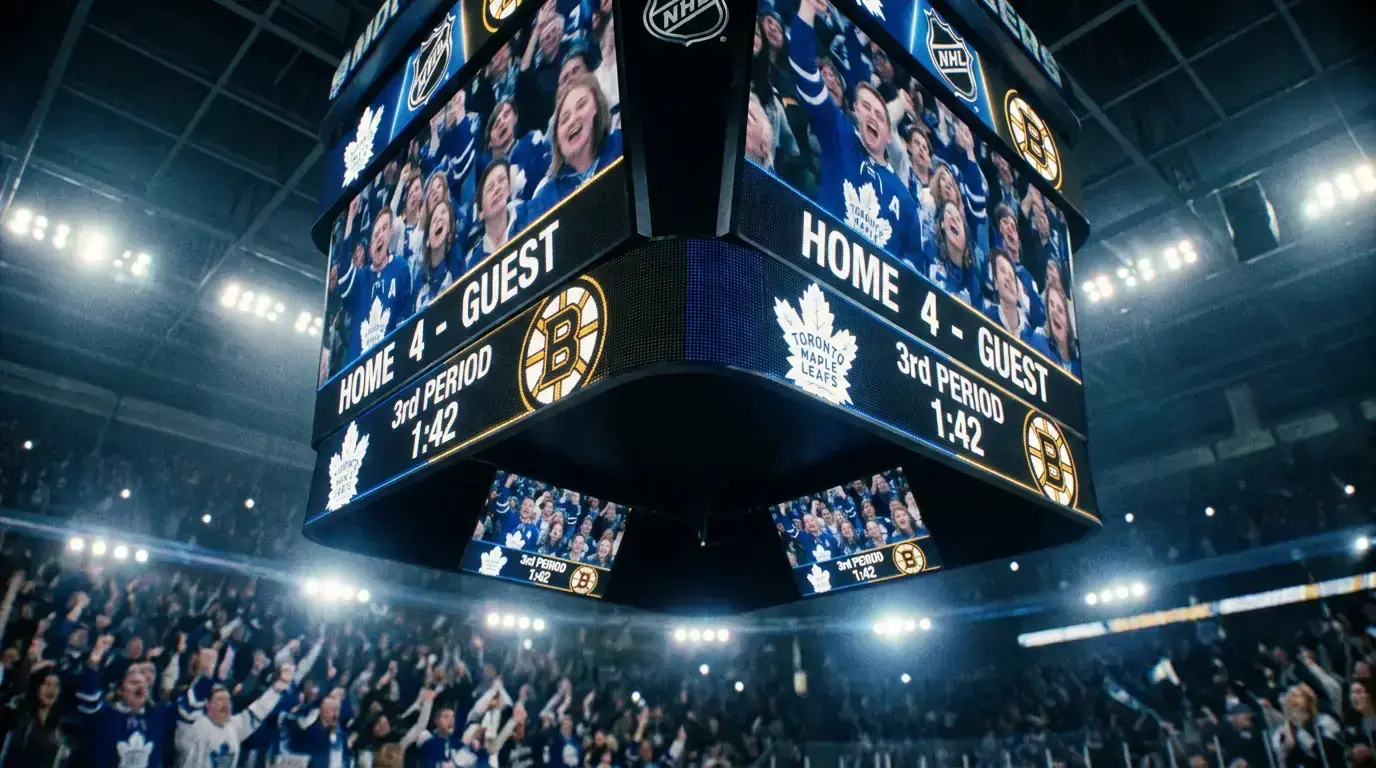NHL arena scoreboard displaying goal totals during a game